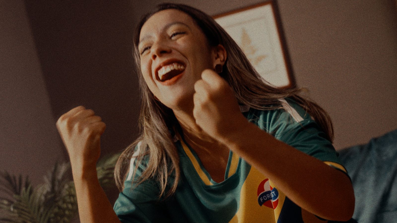 A fan celebrating a goal