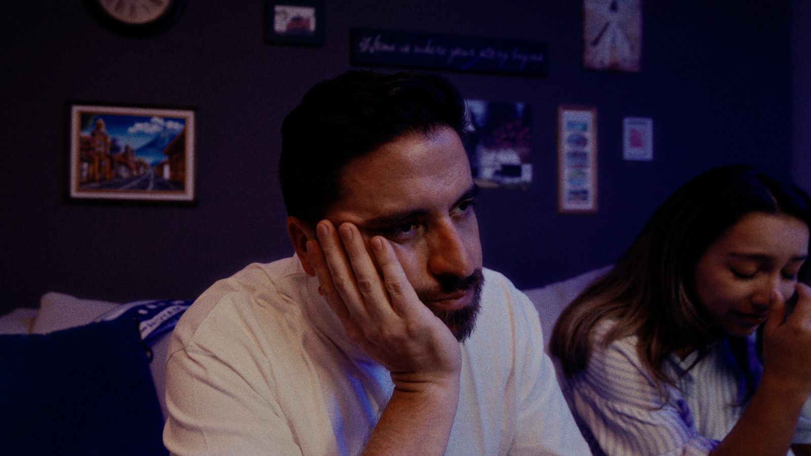 A couple watching the match