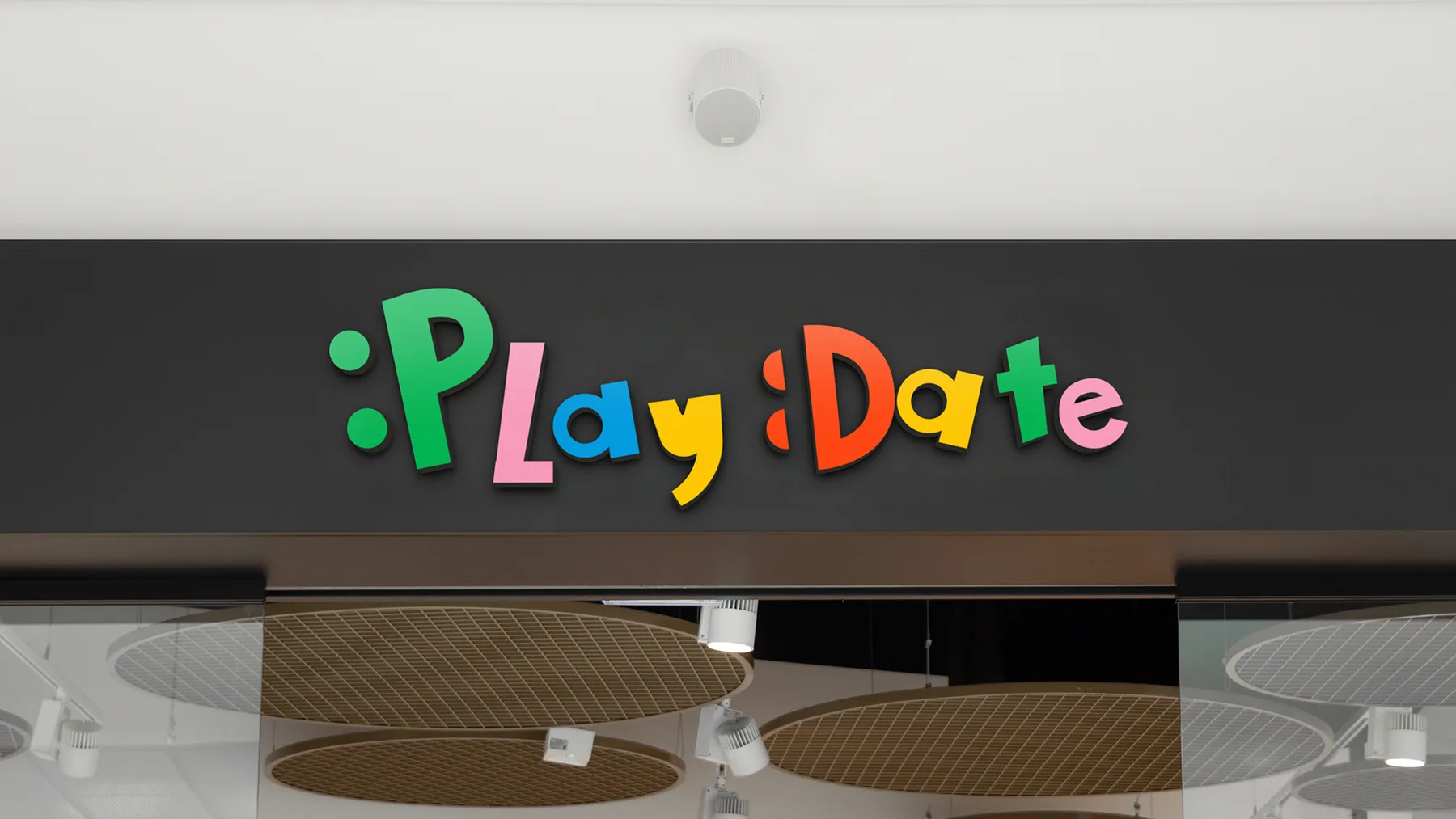 Rótulo de :Play:Date en la fachada del local